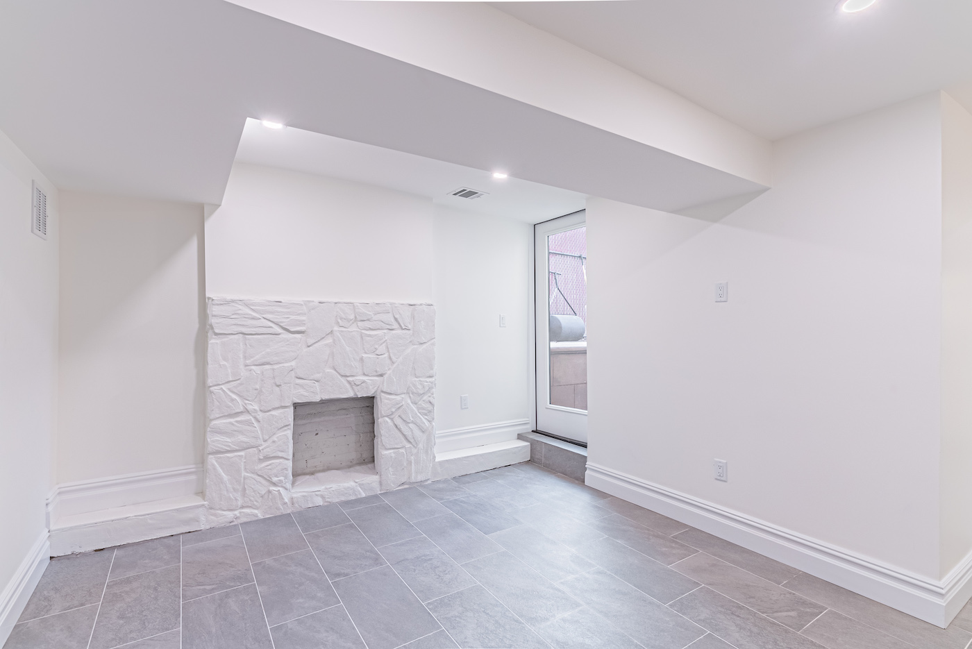white-fireplace-gray-floor